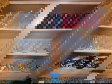 Large Lot of Glassware as seen.  All seen inside the cabinet