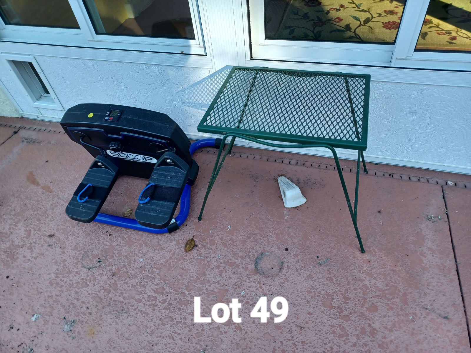 Exercise Machine and Wrought Iron Table/ as seen: Exercise Machine and Wrought Iron Table/ as seen