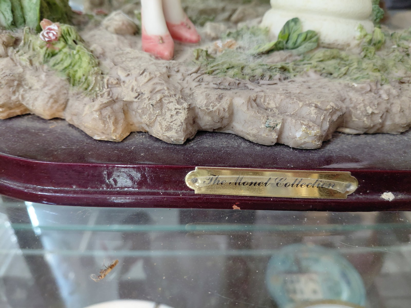 Contents of bottom 3 shelves/ large resin statue, figurines, china, etc - 3