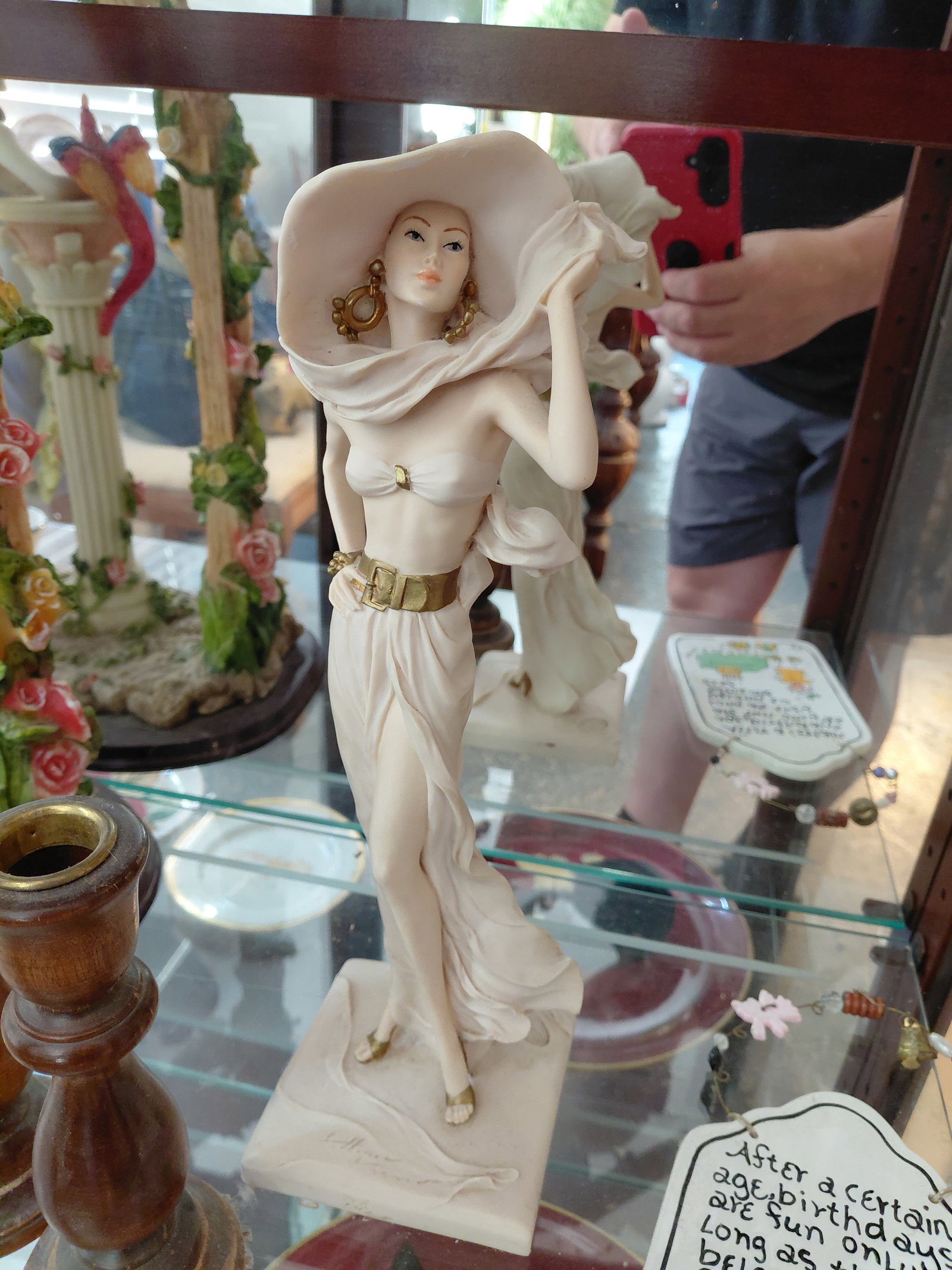 Contents of bottom 3 shelves/ large resin statue, figurines, china, etc - 4