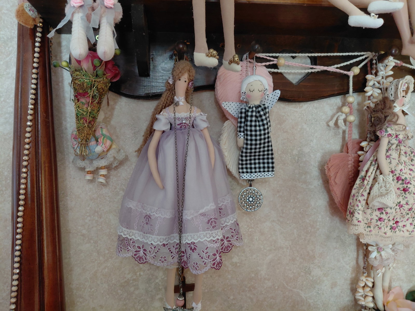 Large Lot of Dolls etc on shelf / shelf not included - 4
