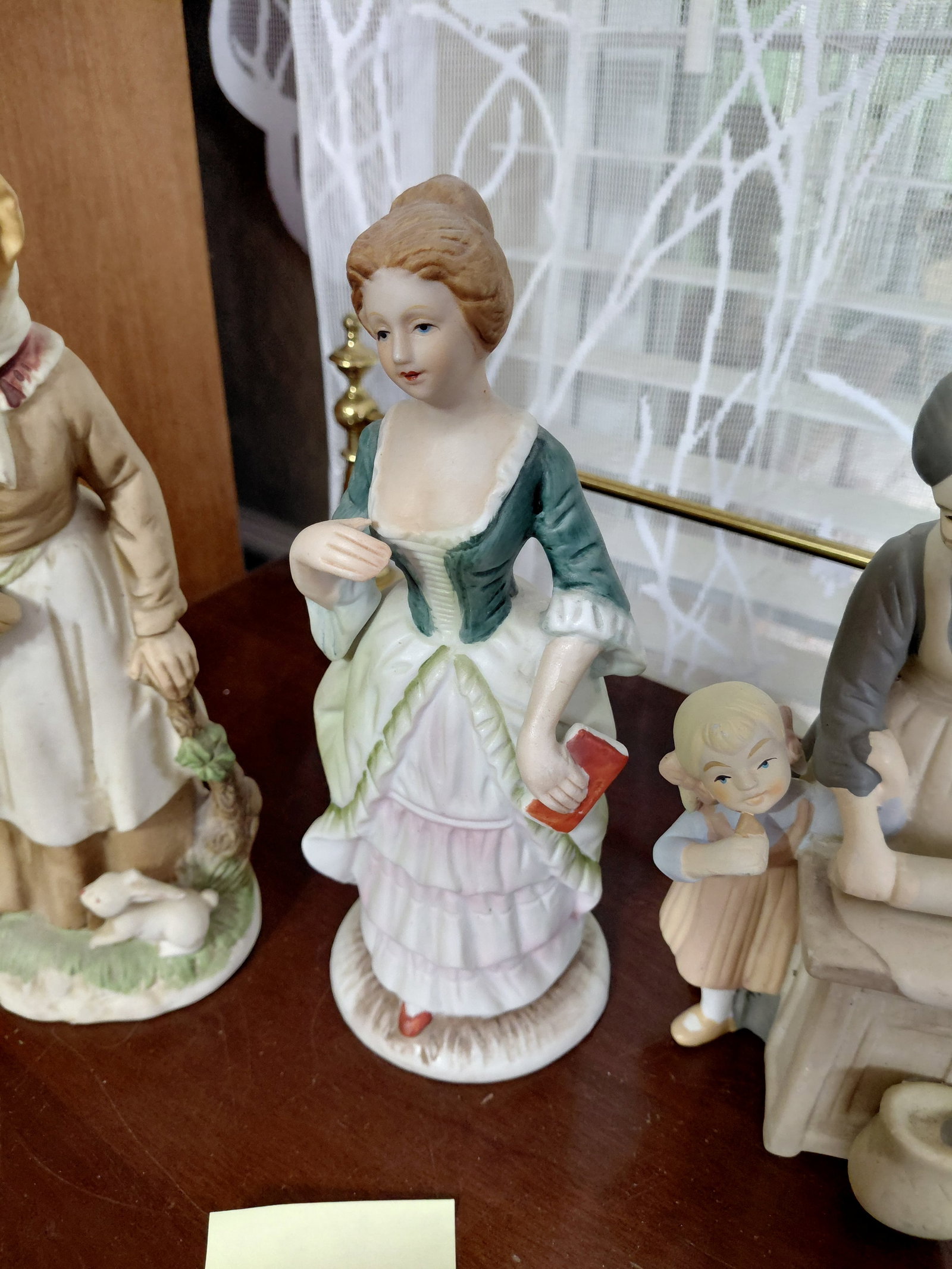 Lot of 4 Porcelain Figurines as seen - 7