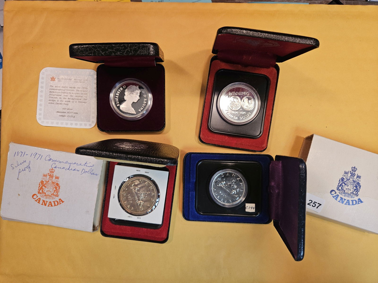 Four Canadian Proof or prooflike Dollars (1 of 5)