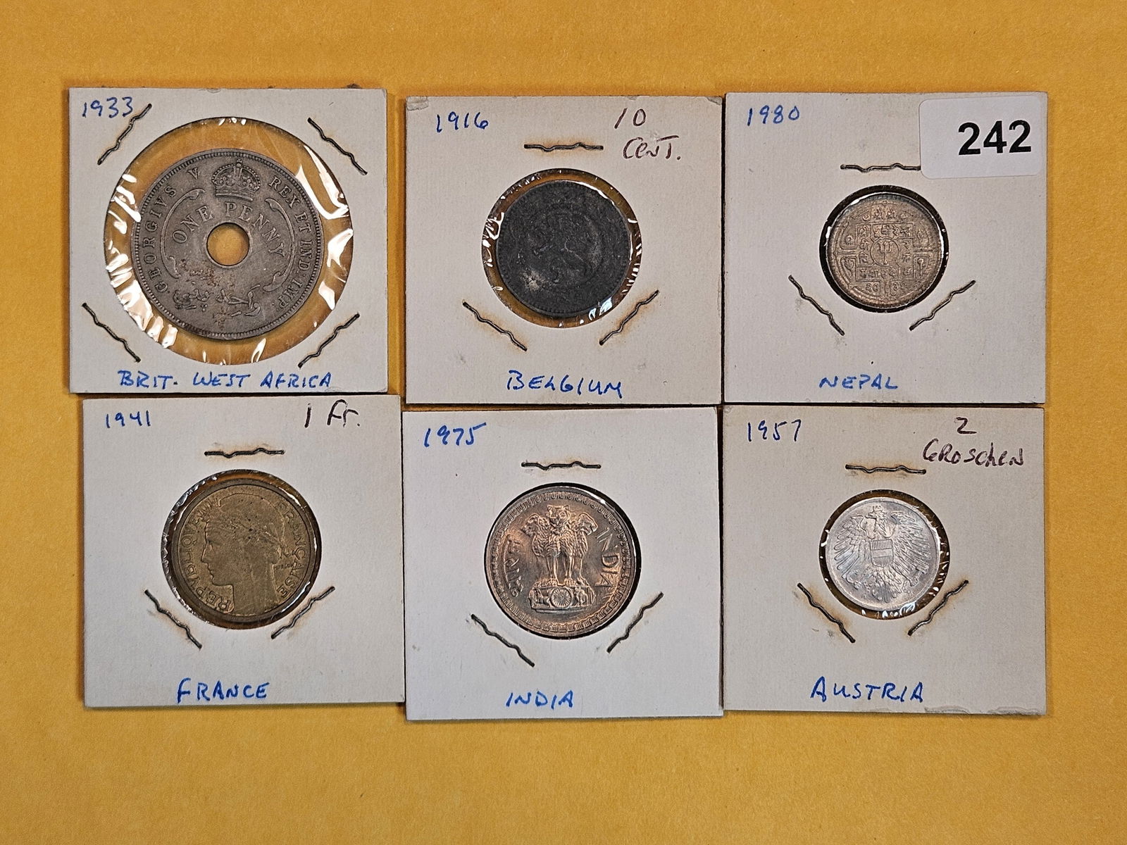 Six mixed World Coins (1 of 2)
