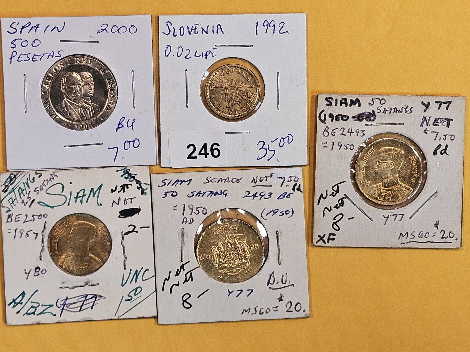 Five better, brilliant uncirculated World coins (1 of 2)