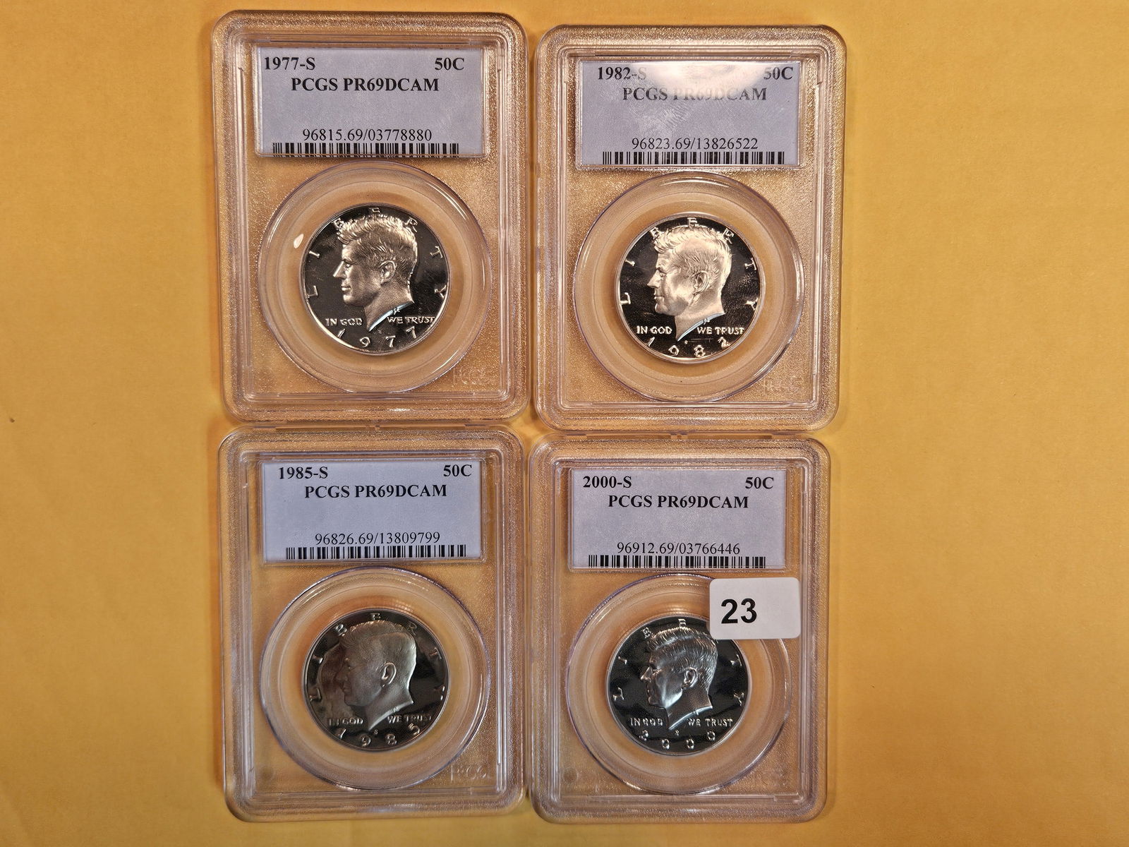 Four near-perfect PCGS Proof 69 Deep Cameo Kennedy Half Dollars (1 of 2)