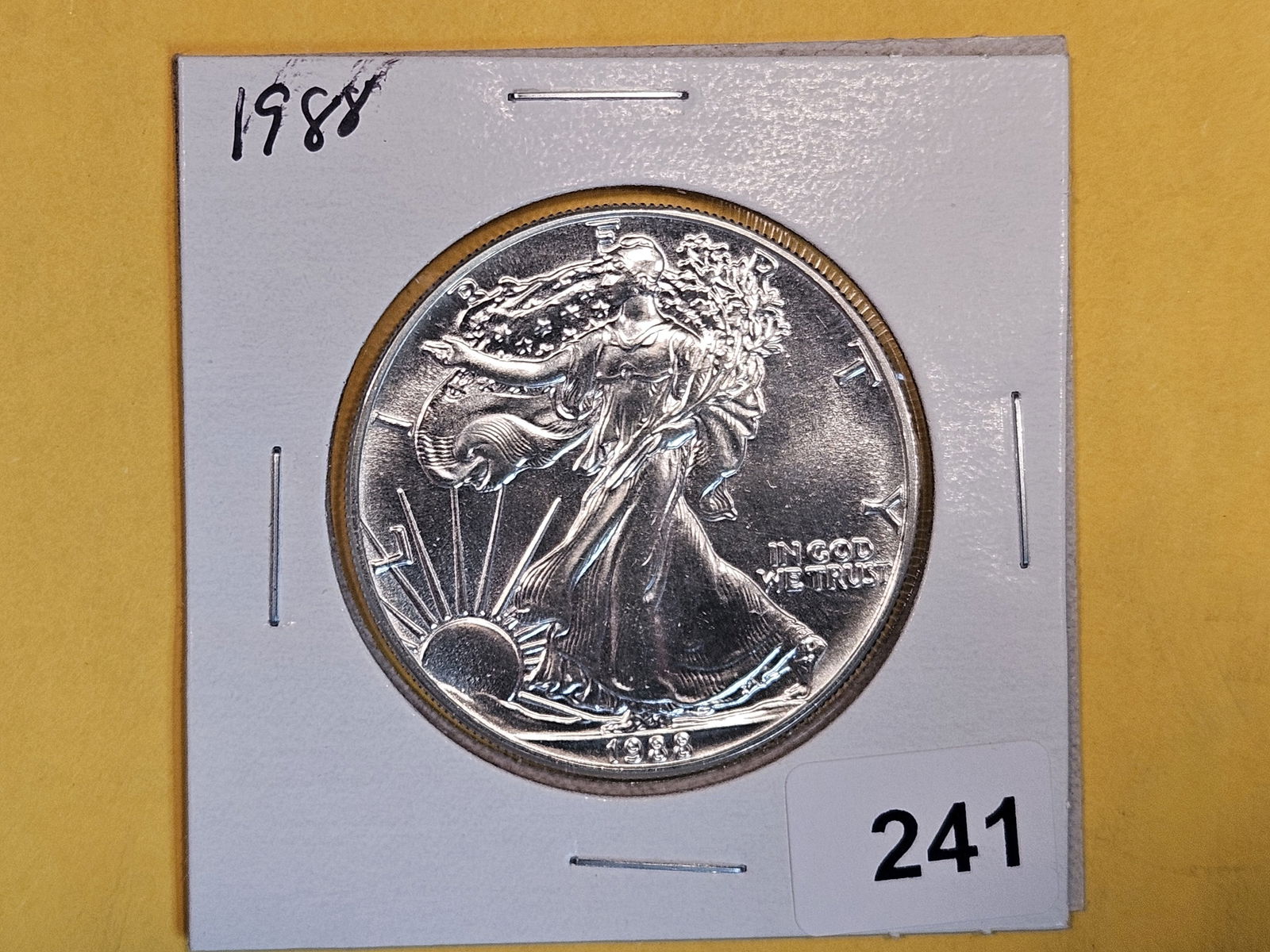 GEM Brilliant uncirculated 1988 American Silver Eagle (1 of 2)