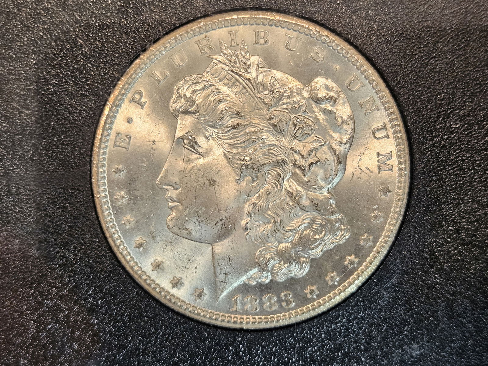 ** KEY DATE ** NGC 1883-CC GSA Morgan Dollar in Mint State 64 (1 of 9)