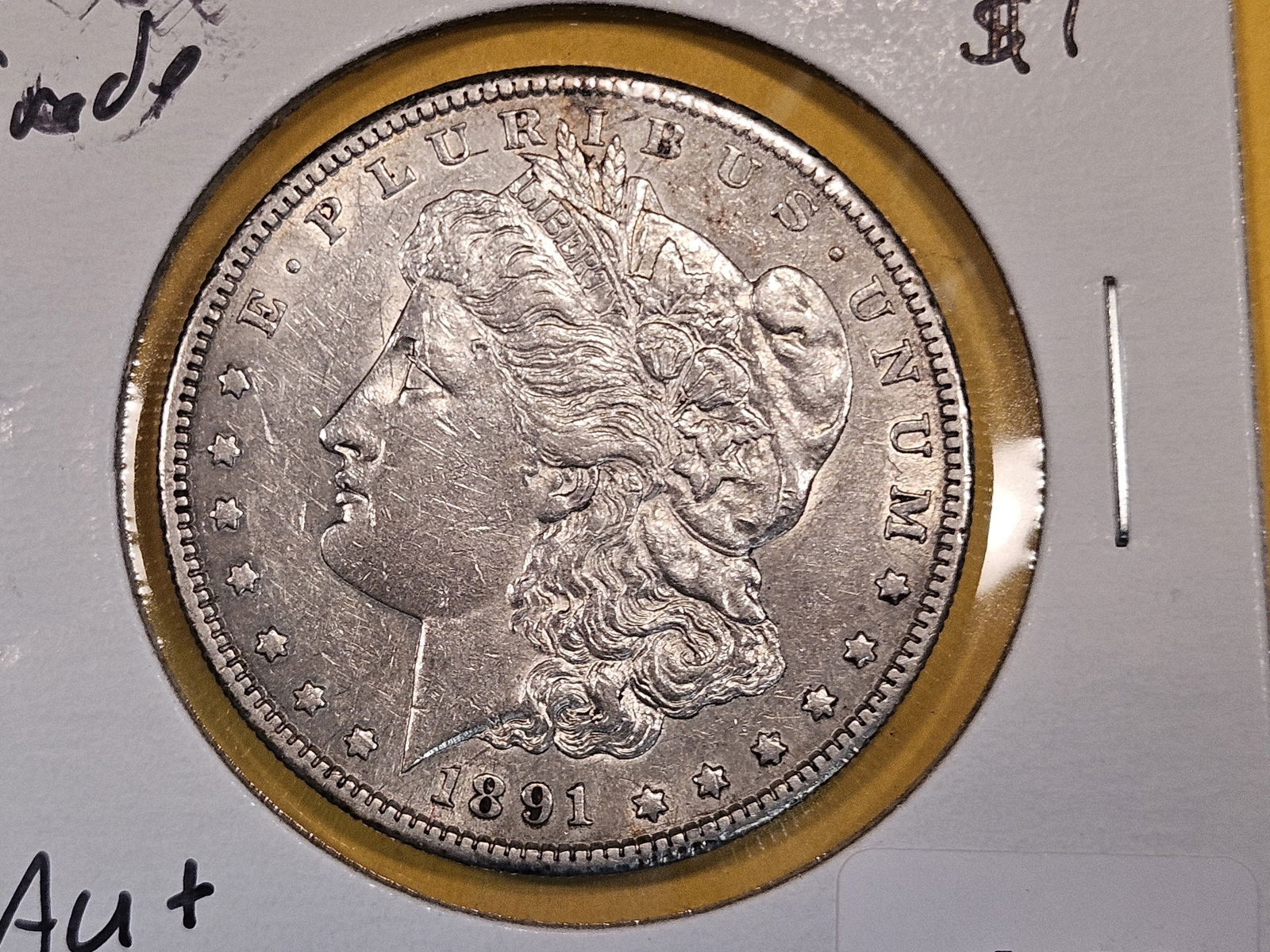 Better grade 1891-S Morgan Dollar (1 of 3)
