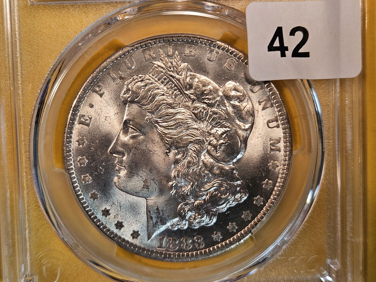 PCGS 1883-O Morgan Dollar in Mint State 63 (1 of 3)