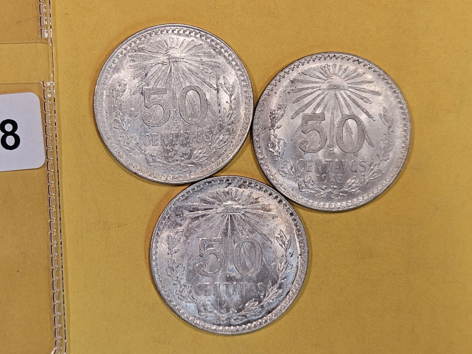 1943, 1944, and 1945 Uncirculated silver Mexico 50 centavos (1 of 4)