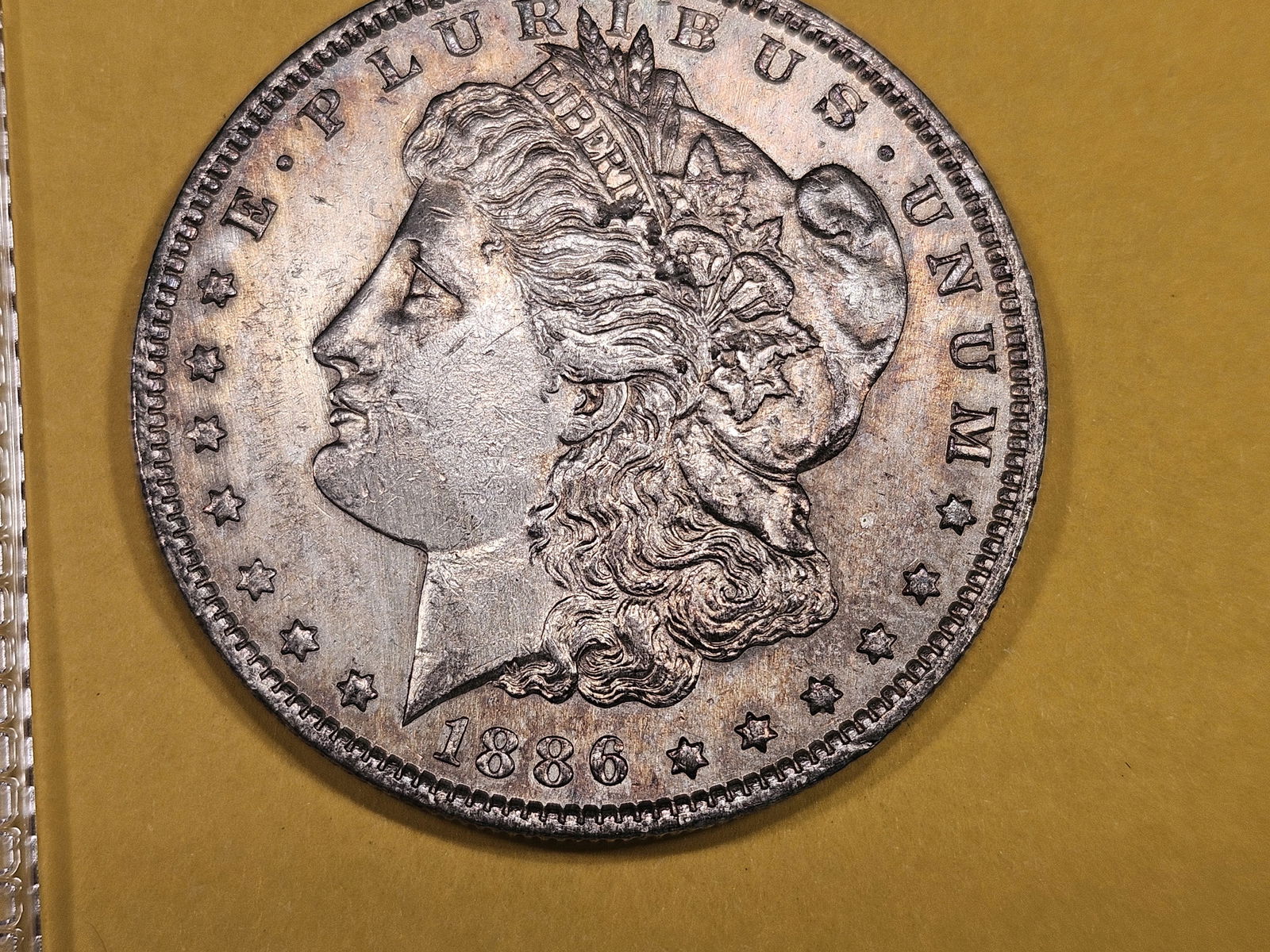 Better grade 1886-O Morgan Dollar (1 of 4)