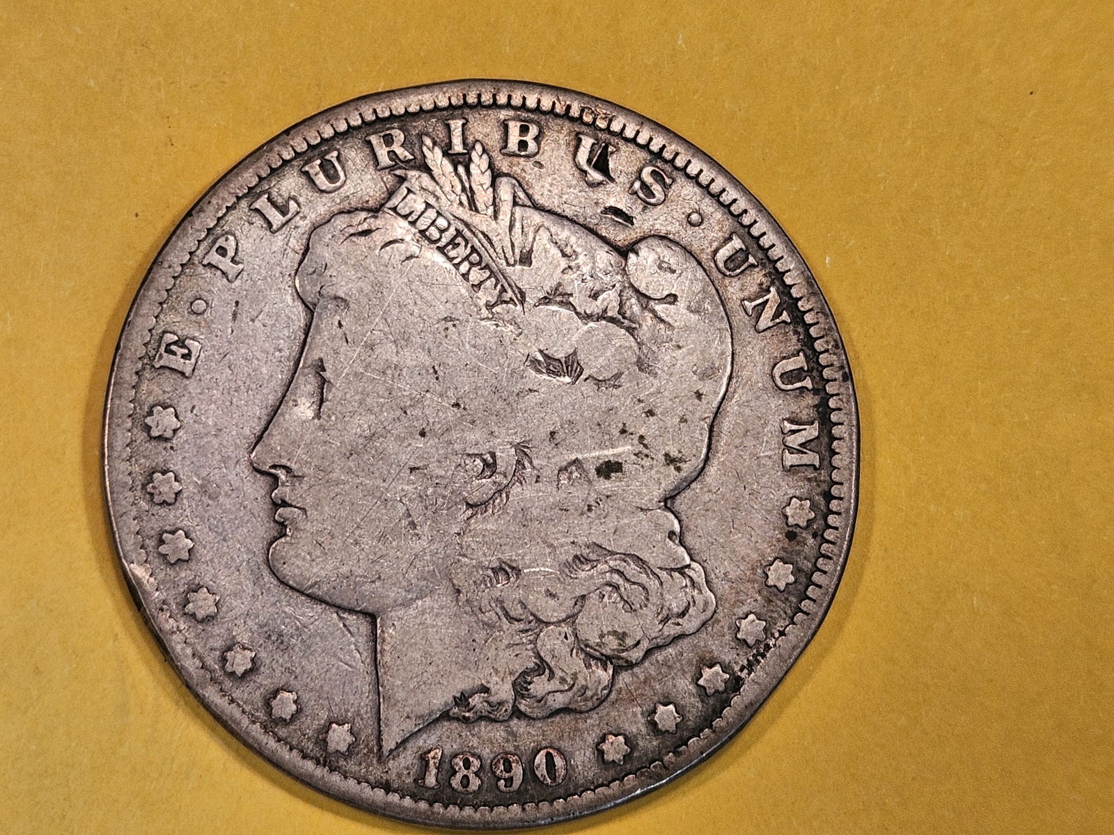 ** KEY DATE ** 1890-CC Morgan Dollar in Good plus (1 of 3)