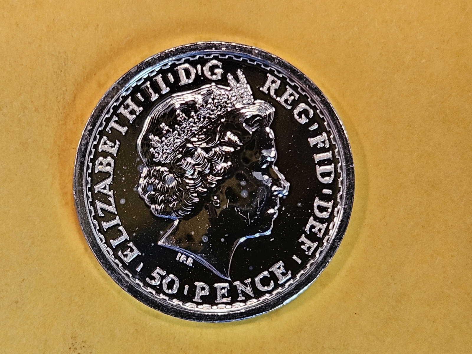 GEM 2013 Brilliant Uncirculated Silver United Kingdom 50 pence SS Gairsoppa: Towards the end of 1940 the British Steam Ship Gairsoppa sailed from Calcutta loaded with 7,000 tons of iron, silver and tea. She was sunk on 17th February 1941 by a German U-Boat with only one member