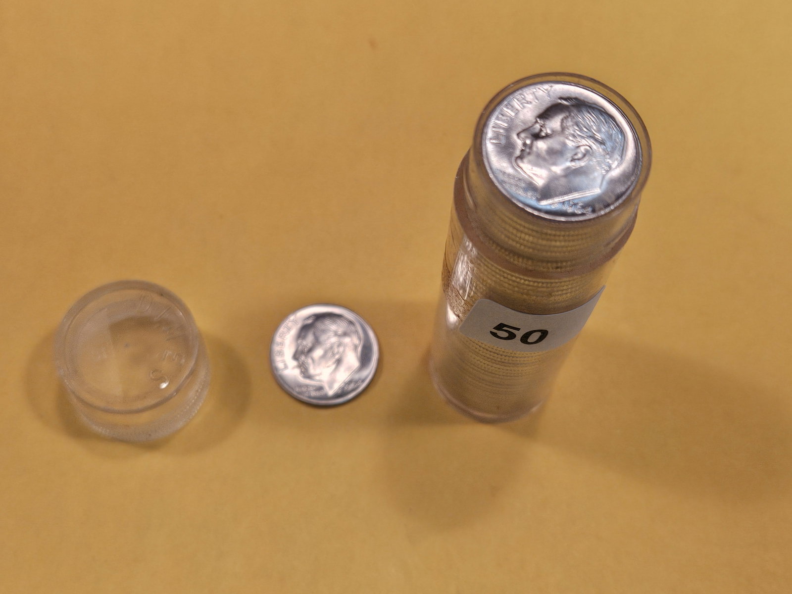 GEM Brilliant Uncirculated Original Roll of 1964-D Blunt 9 variety silver Rooselvelt Dimes: From that old Collection I purchased. The dealer sold all these OBW rolls to a collector. The collector put a lot in tube. The collector has passed and the rolls got sold back to the dealer, from whom