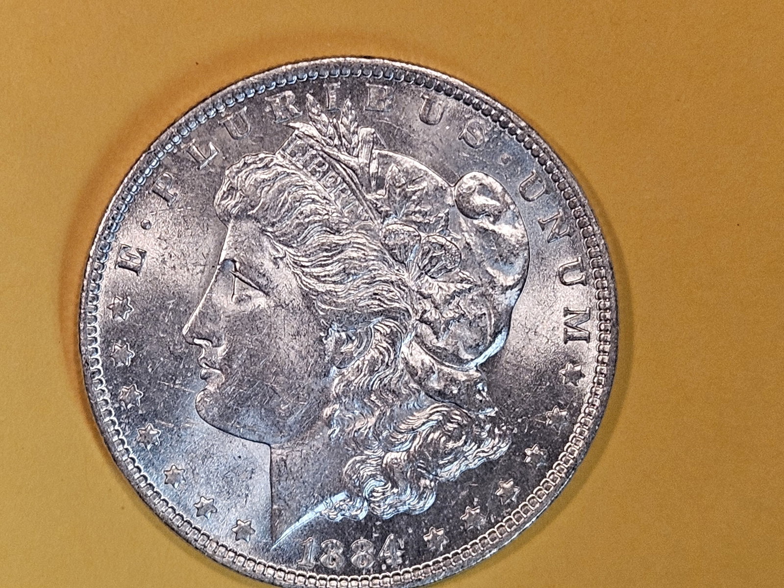 Brilliant Uncirculated Plus 1884-O Morgan Dollar (1 of 3)