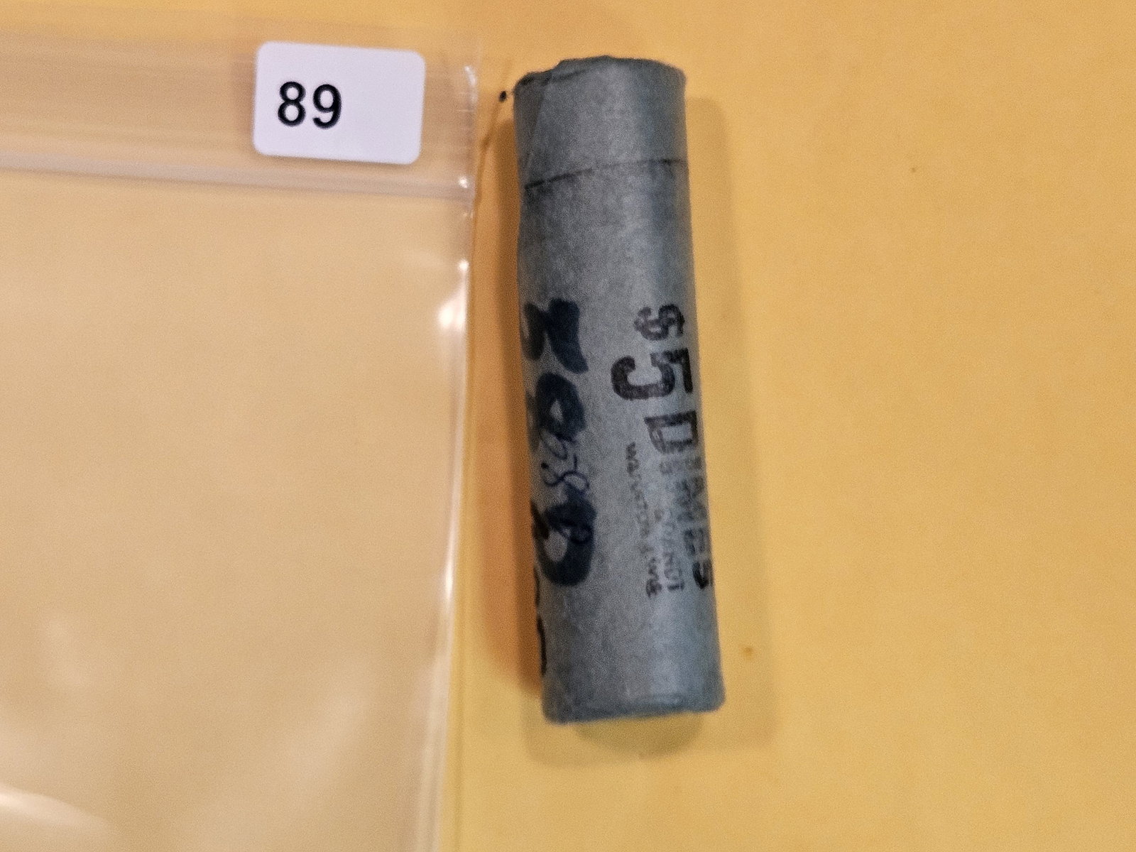 Roll of 1958-D silver Roosevelt Dimes: Came in with a lot of other Original Bank Wrapped rolls. All the others were BU and some in tubes. Both ends show nice toning. We didn't open