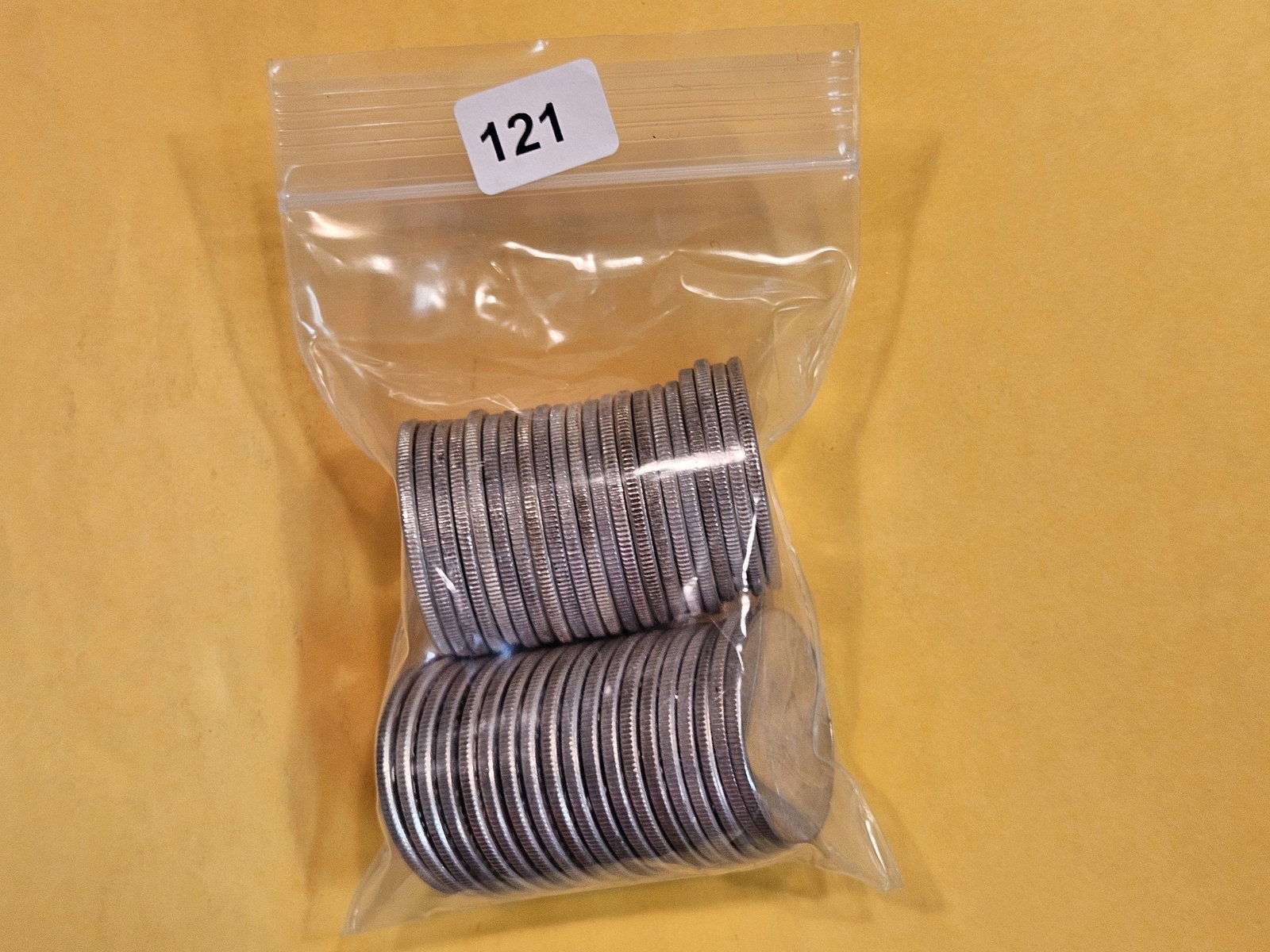 Original Brilliant uncirculated roll of Silver 1964 Kennedy Half Dollars (1 of 3)