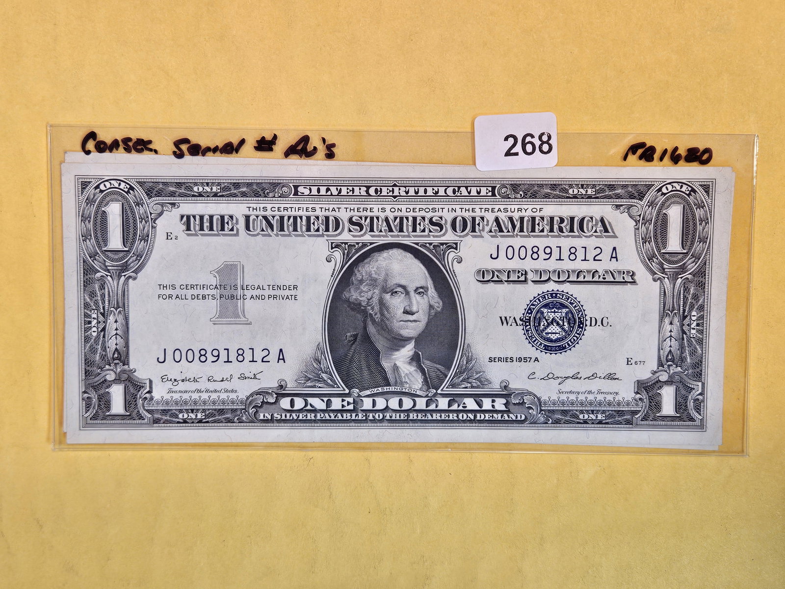 Two Consecutive Crisp About Uncirculated One Dollar Silver Certificates (1 of 2)