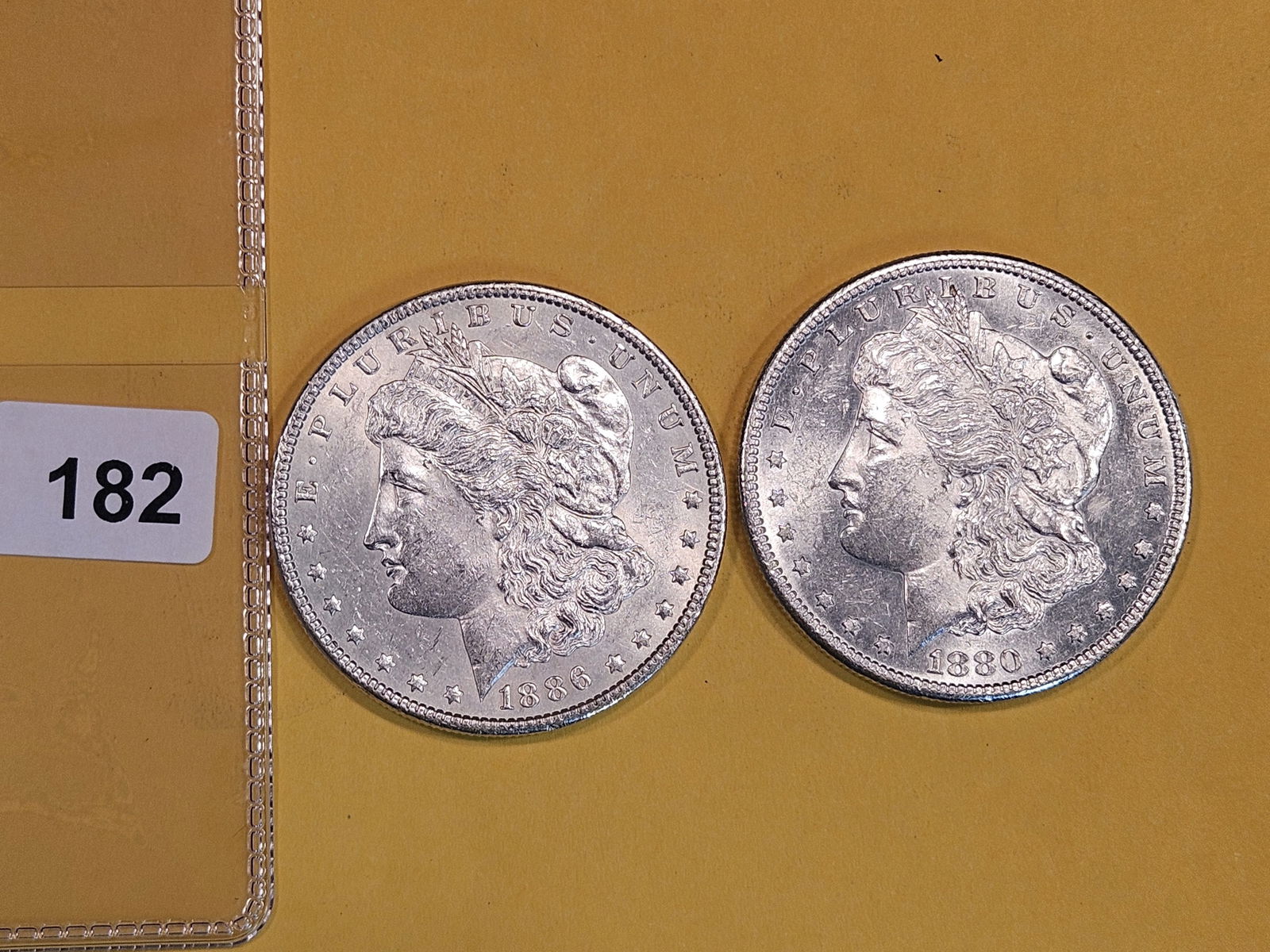 Two Brilliant About Uncirculated plus Morgan Silver Dollars (1 of 2)