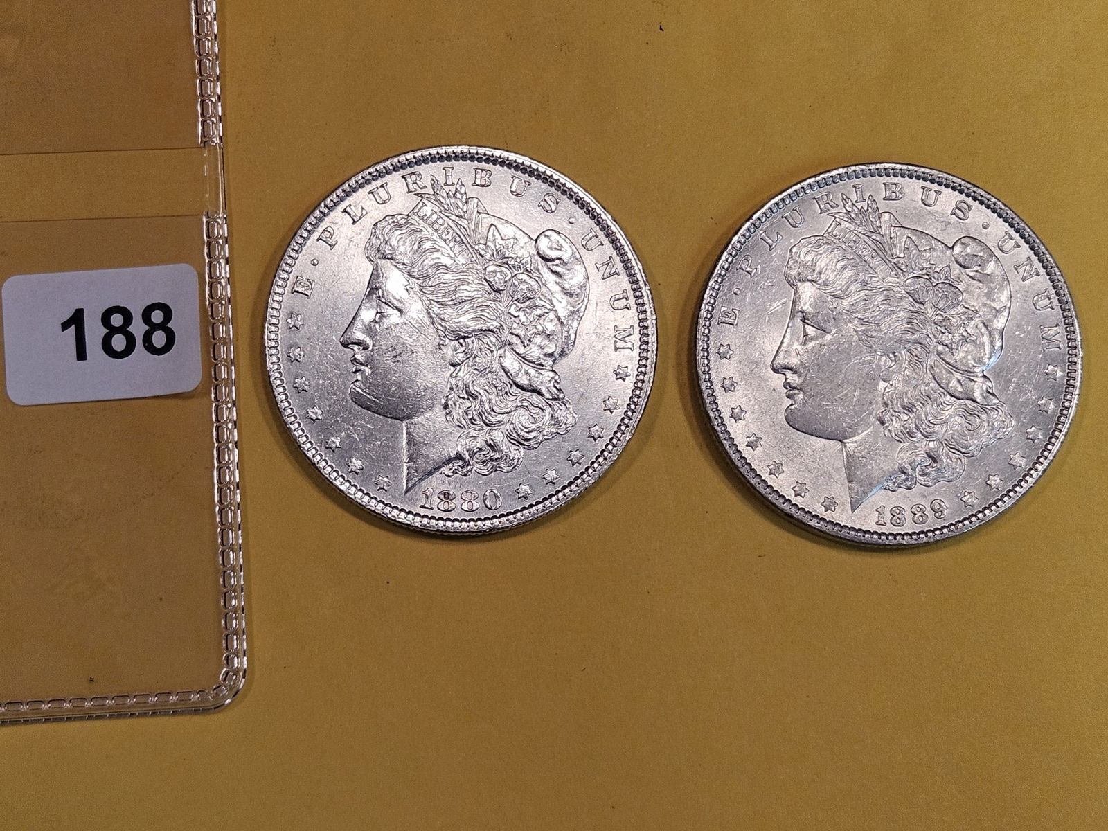 Two Brilliant About Uncirculated plus Morgan Silver Dollars (1 of 2)