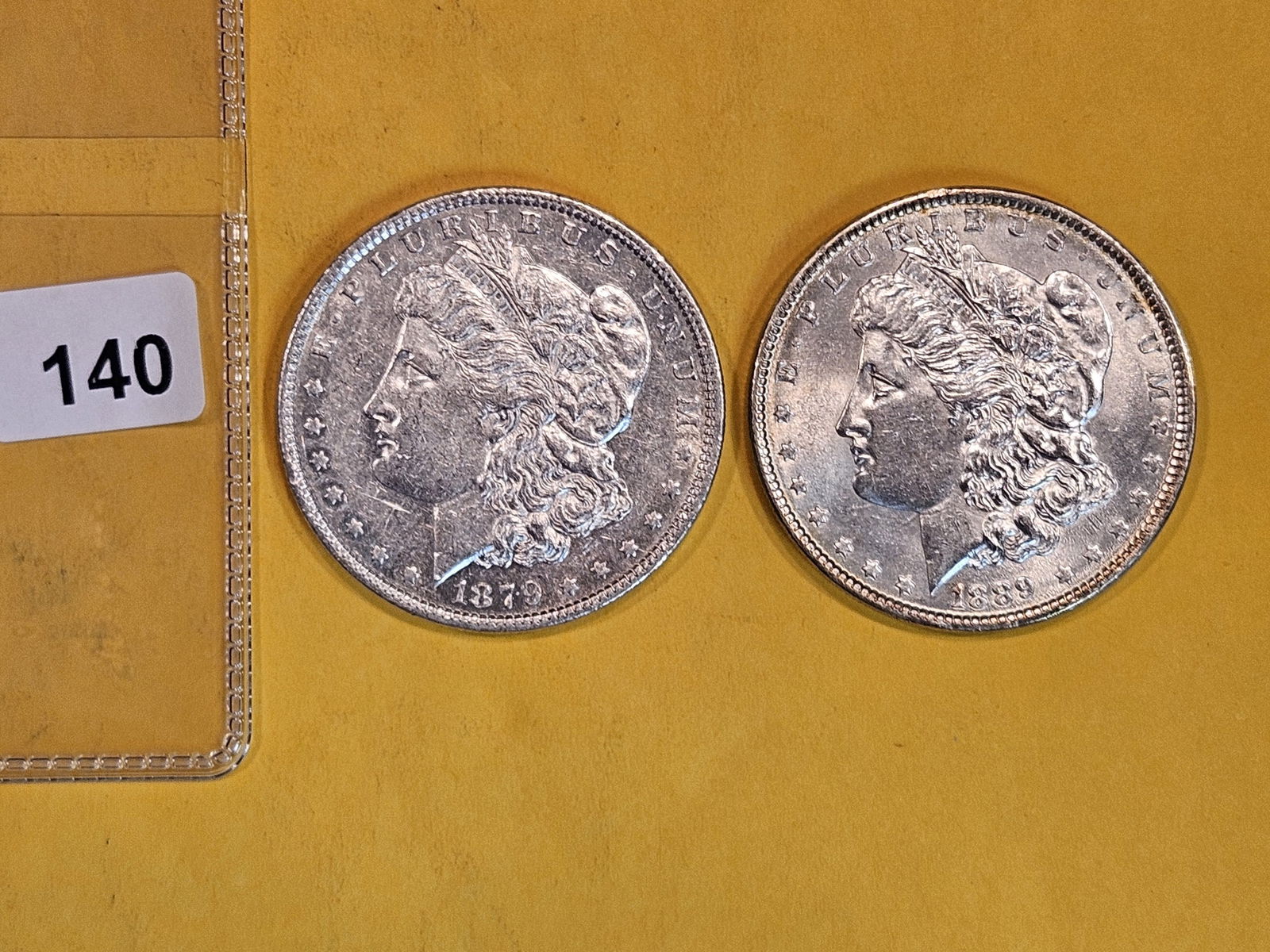 Two Brilliant About Uncirculated Morgan Silver Dollars (1 of 2)