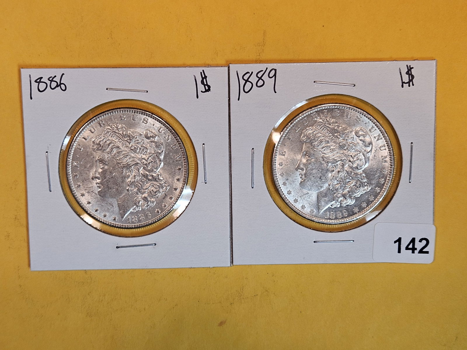 Two Brilliant About Uncirculated plus Morgan Silver Dollars (1 of 2)