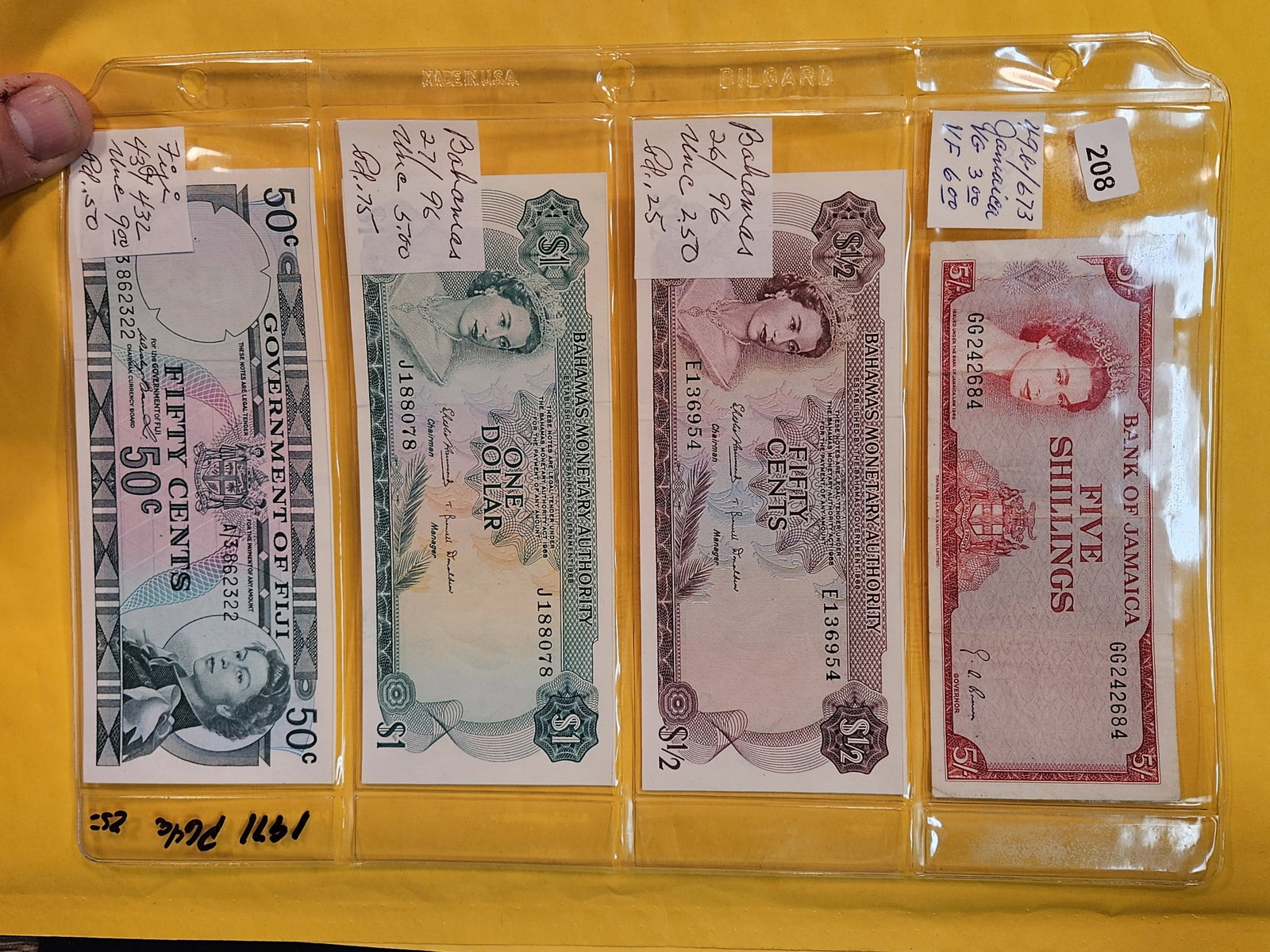Four pieces of World Currency: Jamaica and Fiji