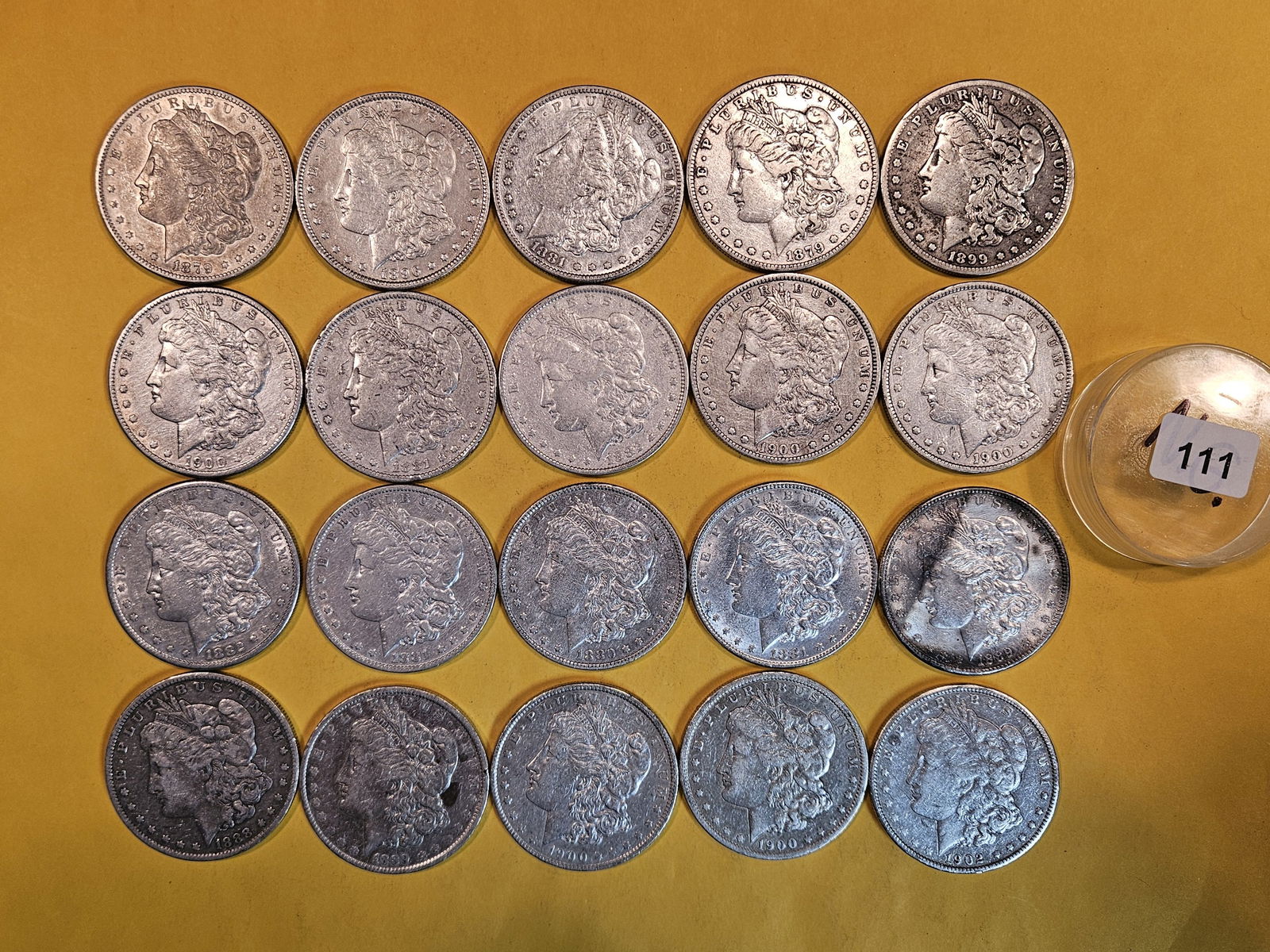 ** FULL ROLL ** Twenty Morgan Silver Dollars: All pre-1904. Grades from Fine through Uncirculated - details