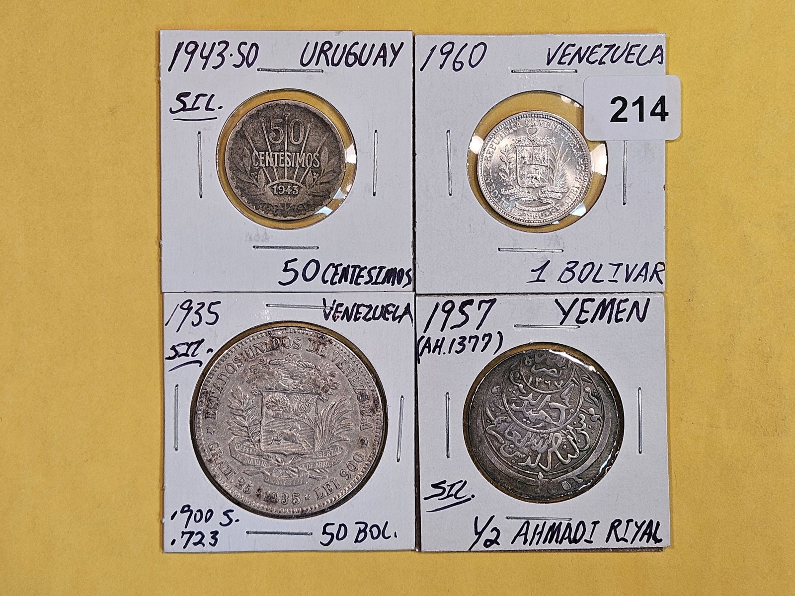 Four lovely silver coins from around the world (1 of 4)