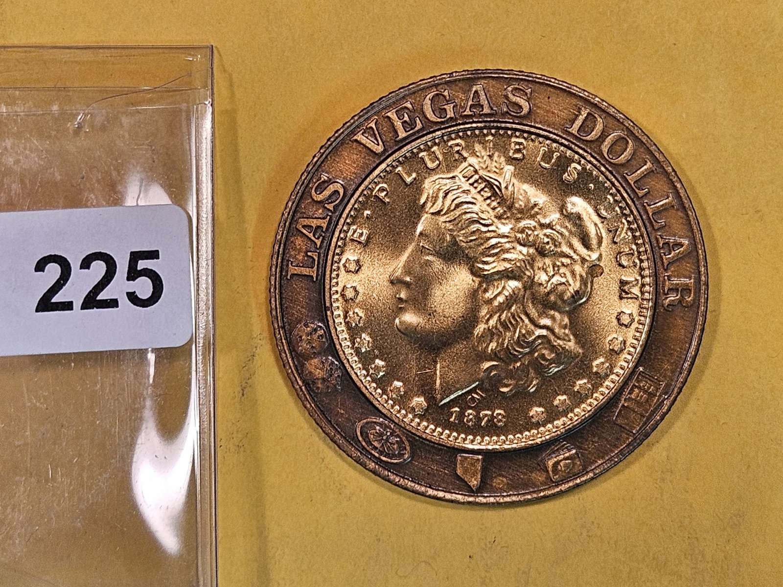Very neat Las Vegas Dollar: Has a gold-like replica of a Morgan Dollar embedded in it
