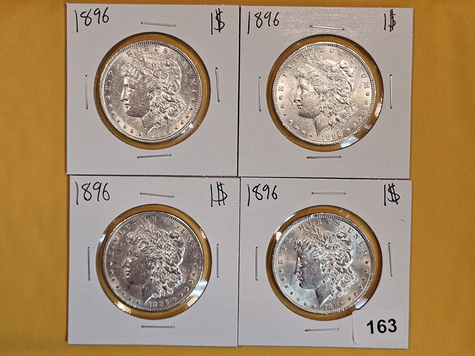 Four Brilliant About Uncirculated plus Morgan Dollars (1 of 2)