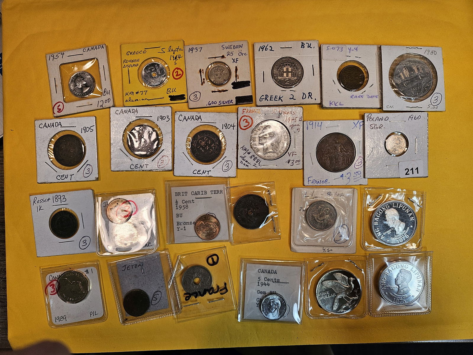 Twenty-four mixed World coins (1 of 5)