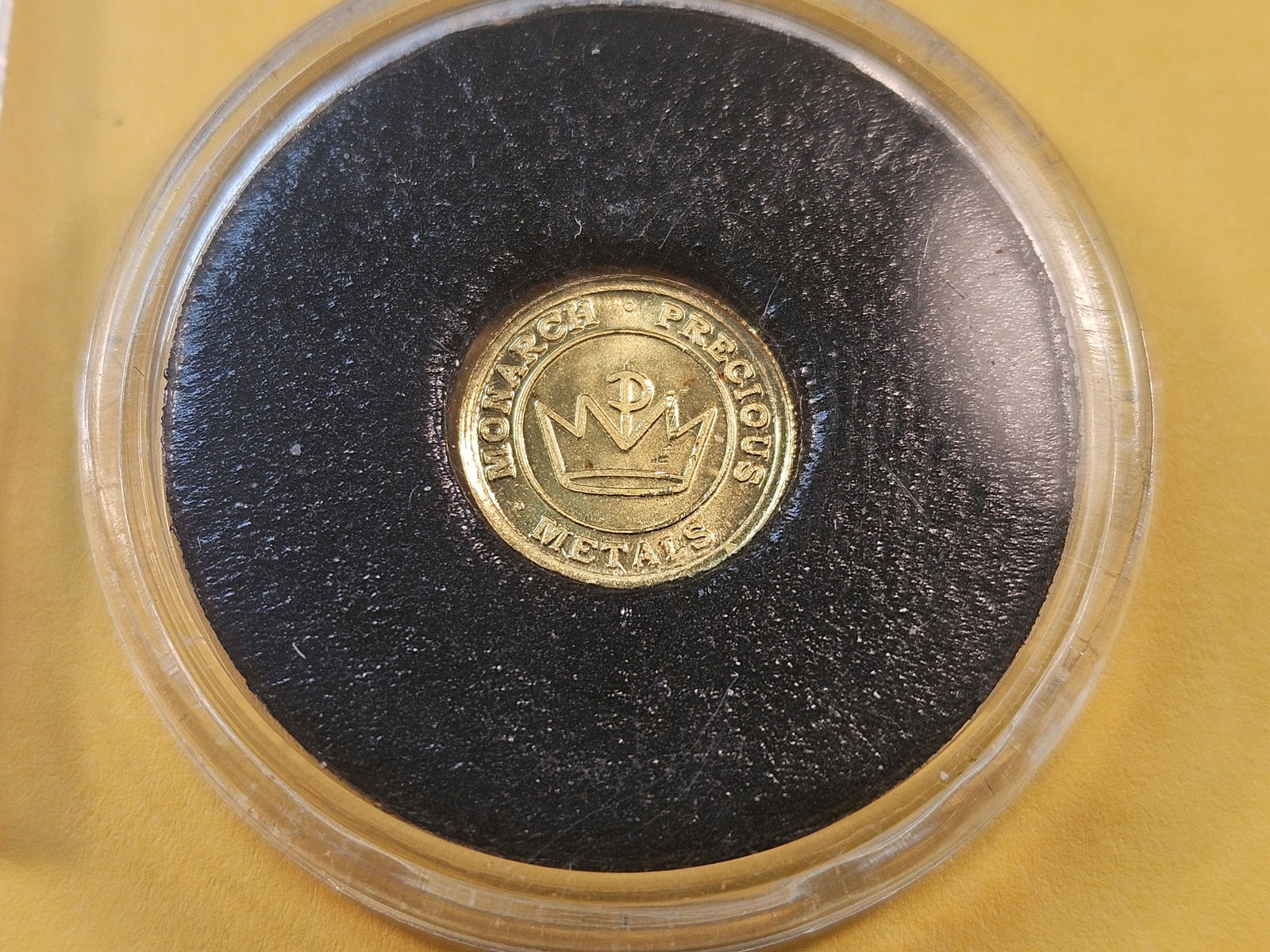 GOLD! Monarch Precious Metals Gold .999 fine one-half gram Gold round: Fractional gold