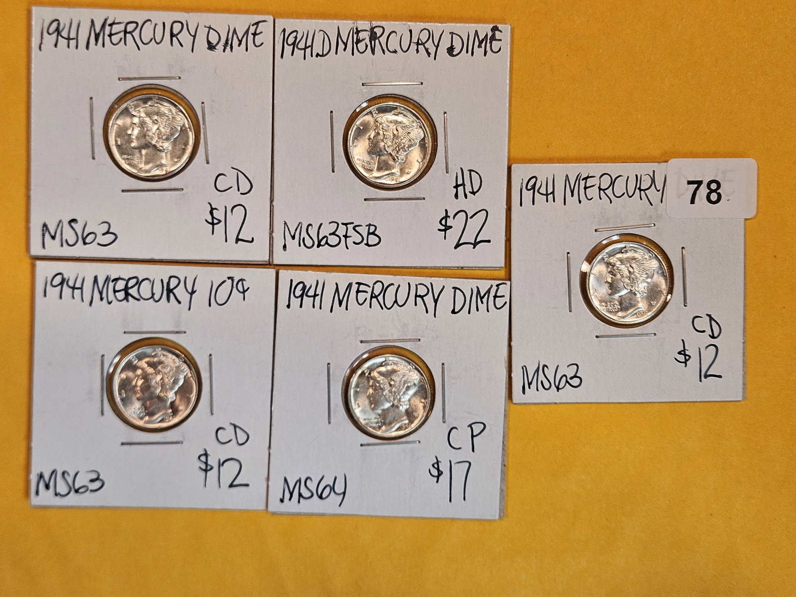 Five Brilliant Uncirculated to Very Choice Brilliant Uncirculated silver Mercury Dimes (1 of 2)