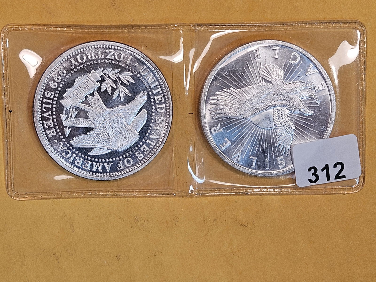 Two 1-Troy ounce .999 fine silver art rounds (1 of 2)