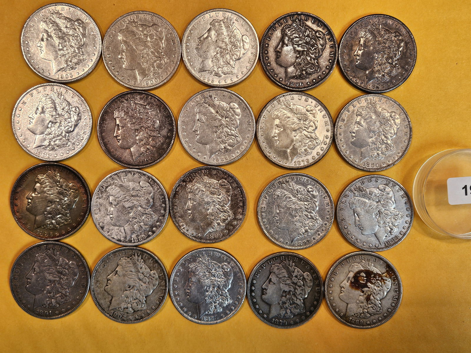 ** FULL ROLL ** Twenty Morgan Silver Dollars: All pre-1904. Grades from Very Good through Uncirculated - details