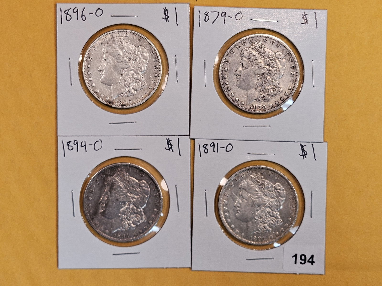 Four slightly better date New Orleans-minted Morgan Dollars (1 of 2)