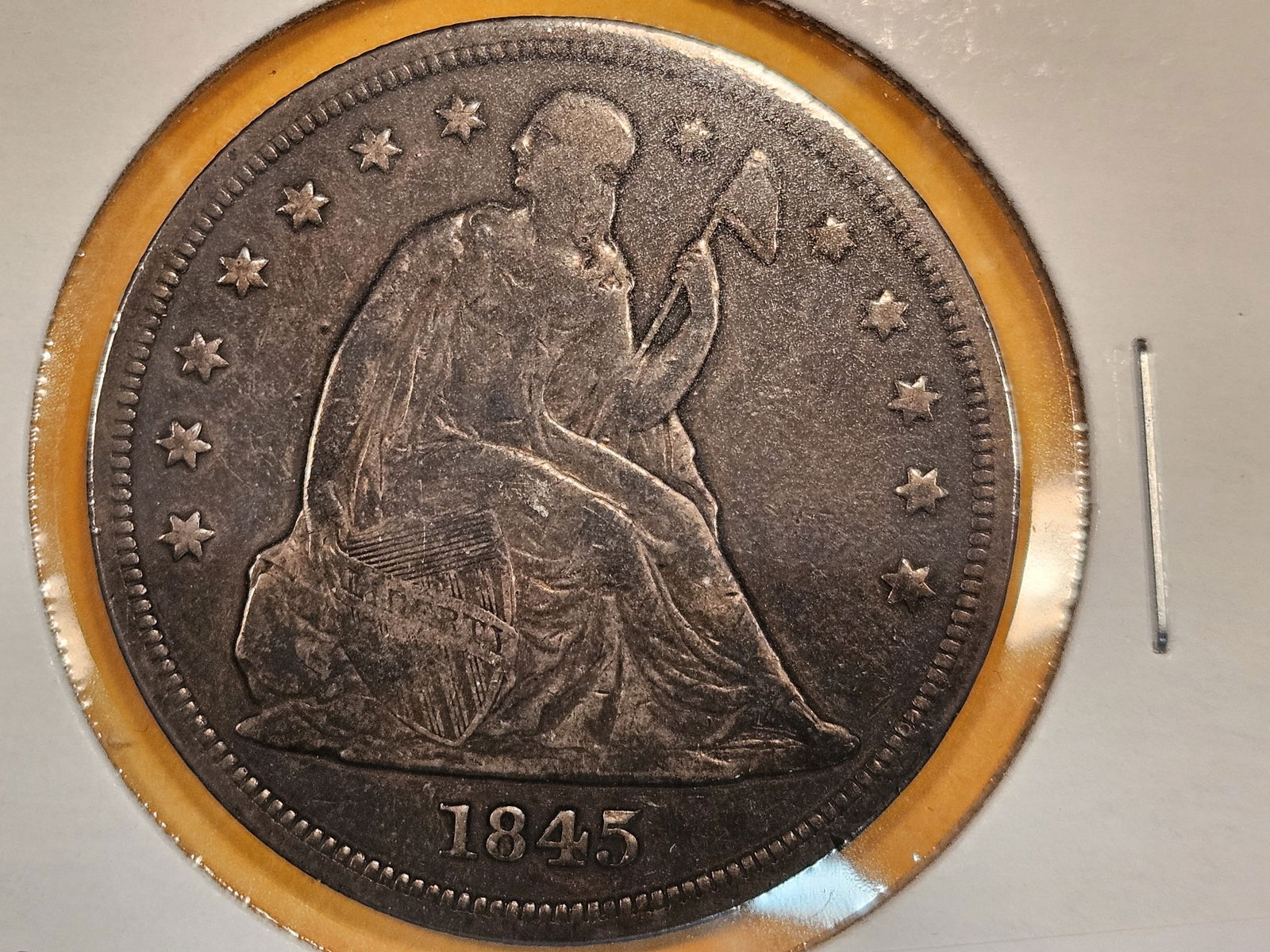 ** 1845 Seated Liberty Dollar in Very Fine plus (1 of 7)