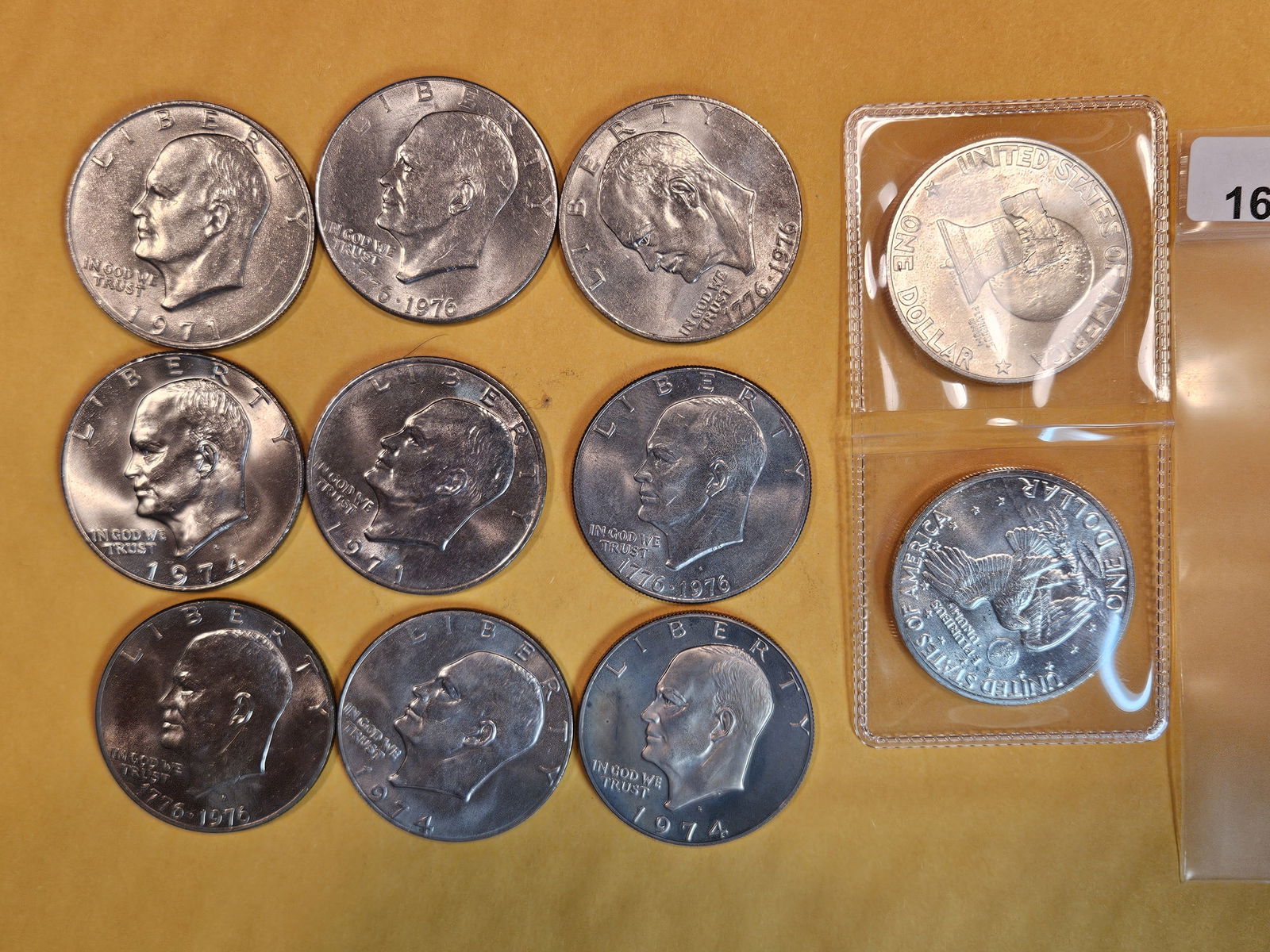 Eleven mixed Eisenhower Dollars (1 of 2)