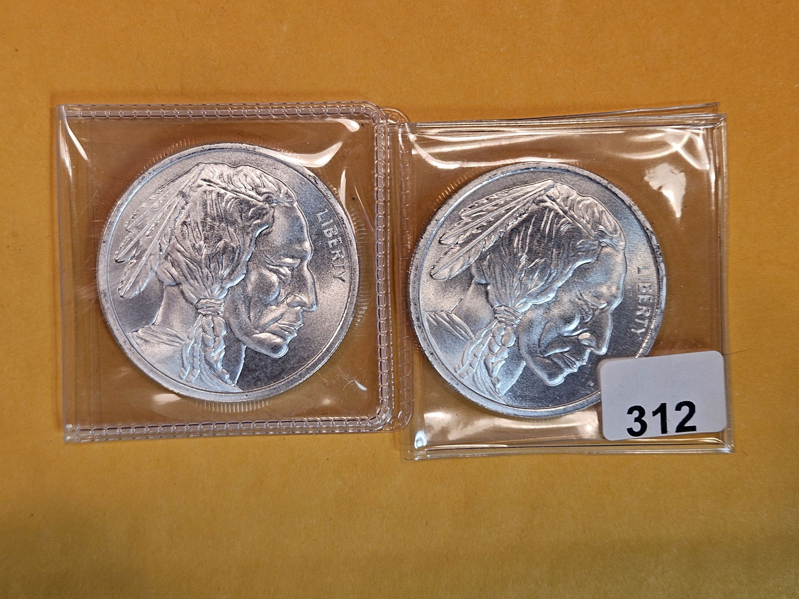 Two 1-Troy ounce .999 fine silver proof art rounds (1 of 2)