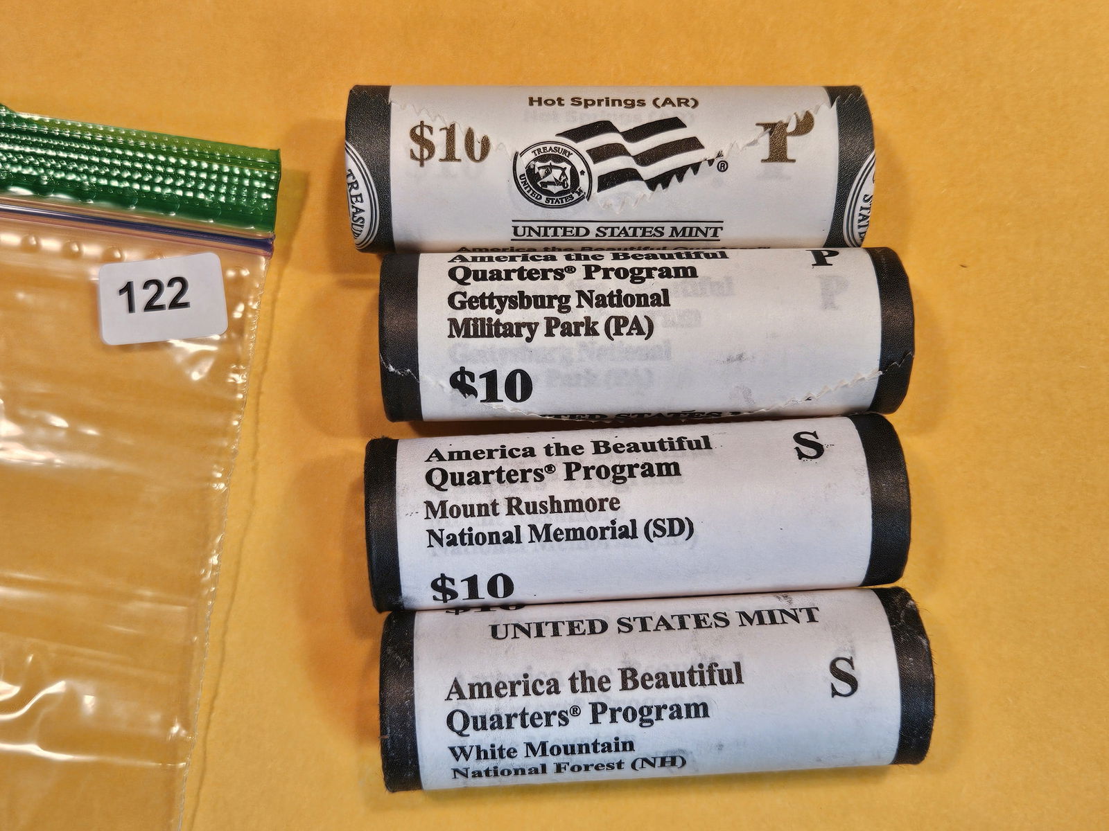 Four Mint-Wrapped Brilliant Uncirculated Washington Quarter Rolls (1 of 2)