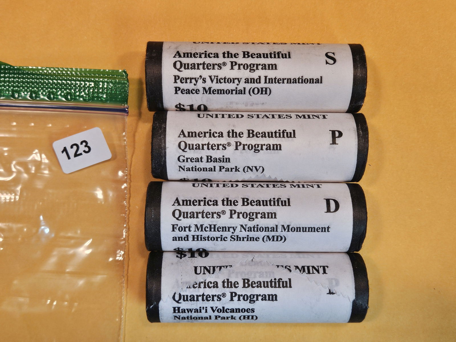 Four Mint-Wrapped Brilliant Uncirculated Washington Quarter Rolls (1 of 2)