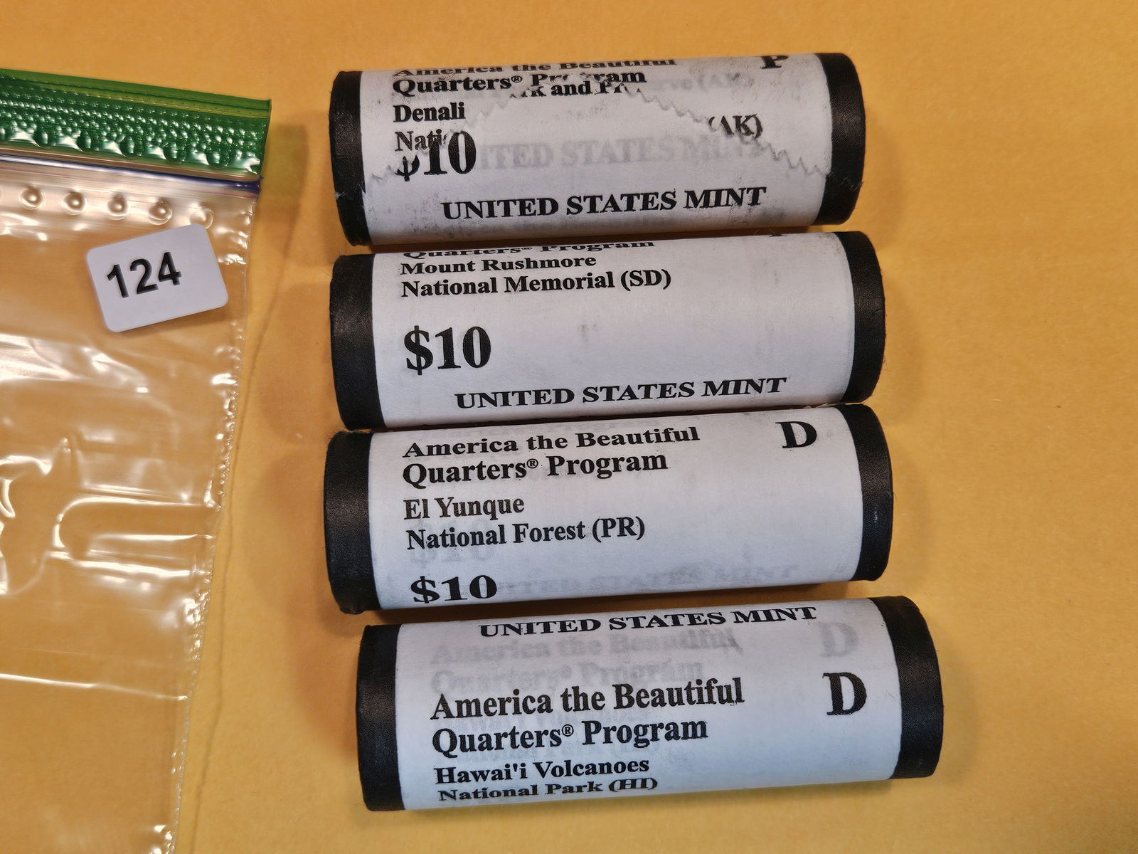 Four Mint-Wrapped Brilliant Uncirculated Washington Quarter Rolls (1 of 2)