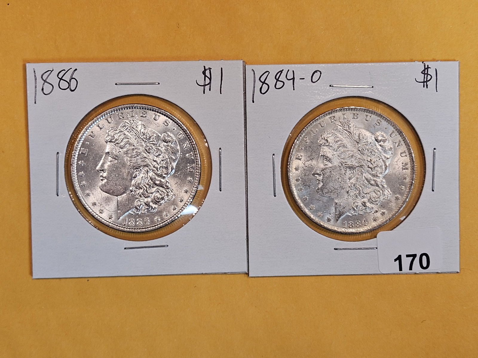 Two Brilliant About Uncirculated plus Morgan Silver Dollars (1 of 2)