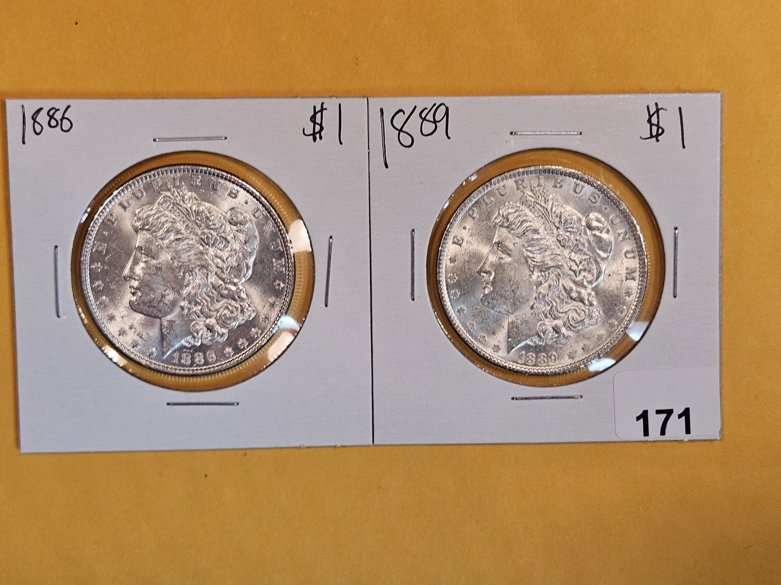 Two Brilliant About Uncirculated plus Morgan Silver Dollars (1 of 2)