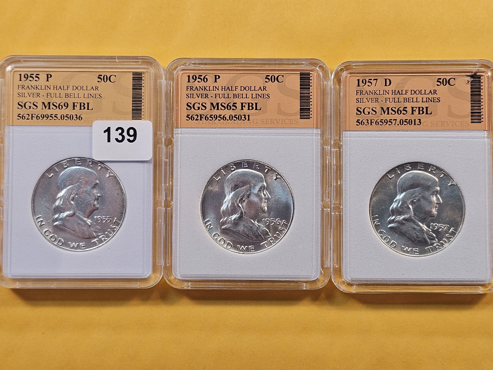 Three Choice Brilliant Uncirculated SGS-Graded Franklin Half Dollars (1 of 8)