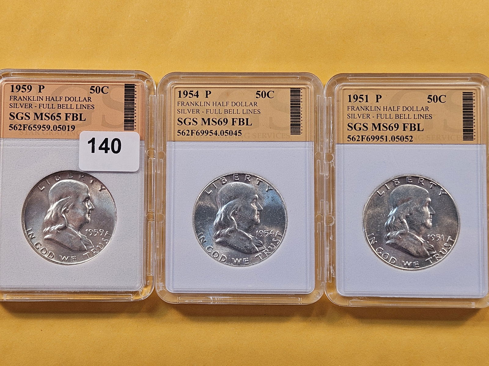 Three Choice Brilliant Uncirculated SGS-Graded Franklin Half Dollars (1 of 8)