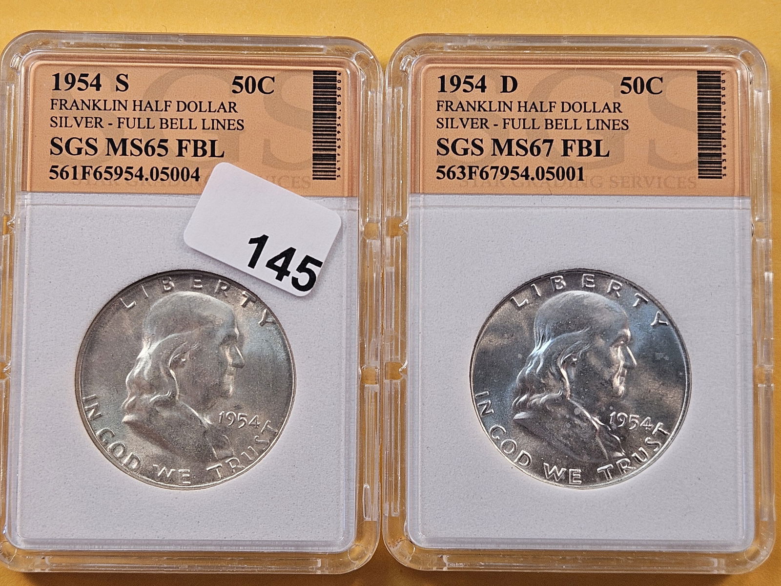 Two Choice Brilliant Uncirculated SGS-Graded Franklin Half Dollars (1 of 6)