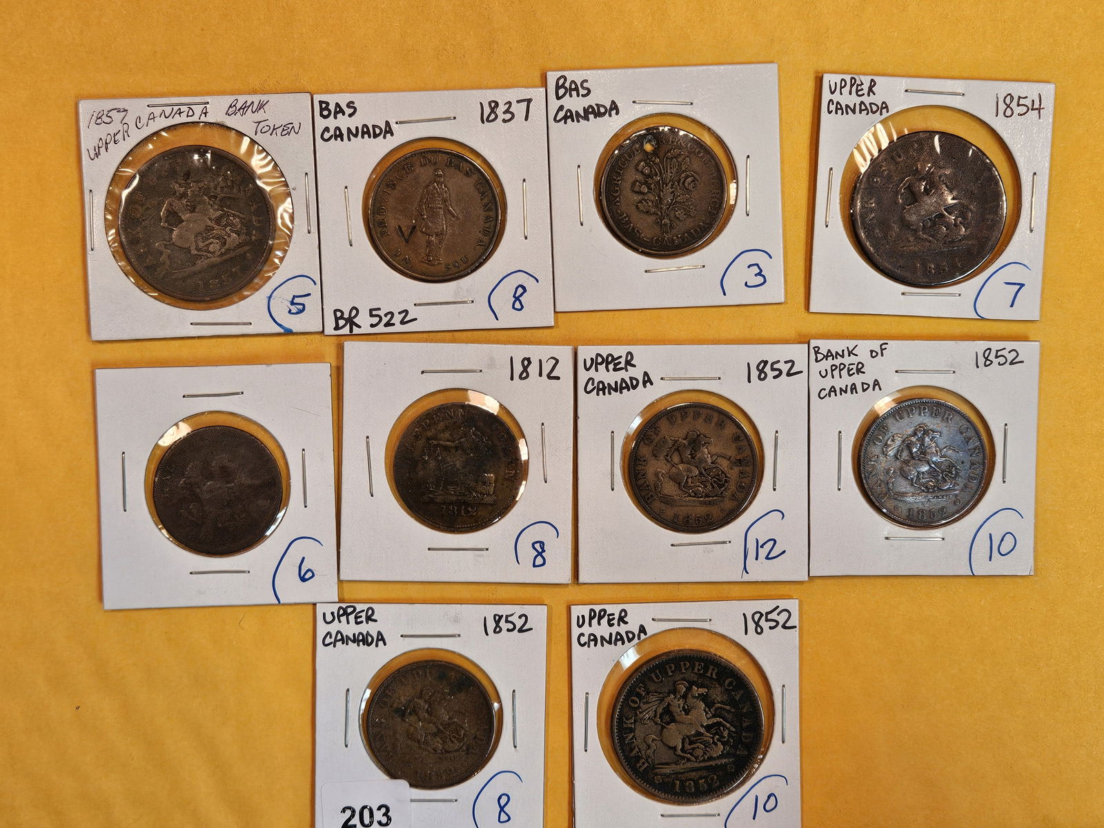 Ten mixed Canadian bank tokens and early coppers (1 of 6)